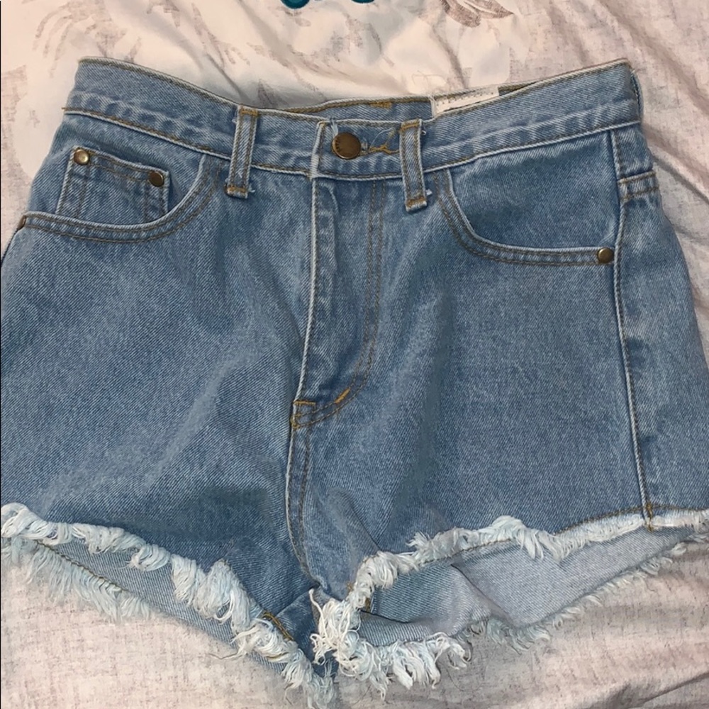 Jean shorts with distress at the bottom